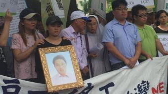 Nguyen Quoc Phi's sister and father (second and third from left) among protesters 15 September 2017