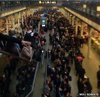 Queues forming at St Pancras station because of delays and cancellations on Eurostar services