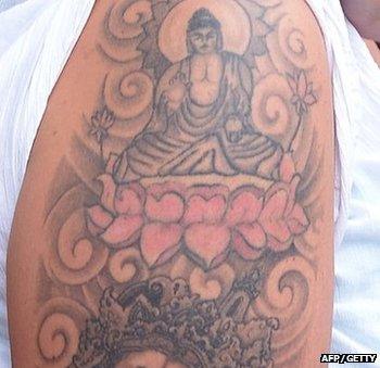 Buddha tattoo woman flies from Sri Lanka 'with apology' - BBC News