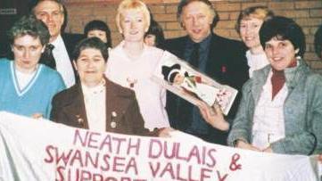 Arthur Scargill being presented with a Welsh doll