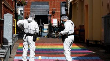 Forensics officers at the scene