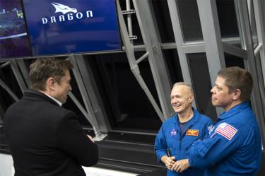 SpaceX Dragon capsule docks with space station