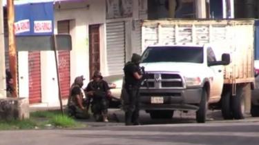 Armed people are seen in Culiacán, Sinaloa state, Mexico. Photo: 17 October 2019