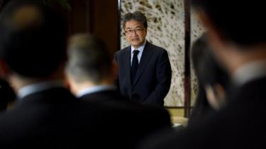 Joseph Yun (C), US special representative for North Korea policy, answers questions from reporters following a meeting with Japanese and South Korean chief nuclear negotiators at the Iikura Guesthouse in Tokyo on 27 April 2017.