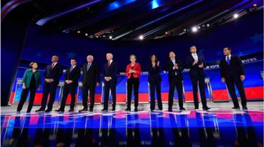 Democratic presidential hopefuls (L-R) Senator of New Jersey Cory Booker, Mayor of South Bend, Indiana, Pete Buttigieg, Senator of Vermont Bernie Sanders, Former Vice President Joe Biden, Senator of Massachusetts Elizabeth Warren, Senator of California Kamala Harris, Tech entrepreneur Andrew Yang, Former Representative of Texas Beto O'Rourke and Former housing secretary Julian Castro stand onstage ahead of the third Democratic primary debate of the 2020 presidential campaign season hosted by ABC News in partnership with Univision at Texas Southern University in Houston, Texas on September 12, 2019.