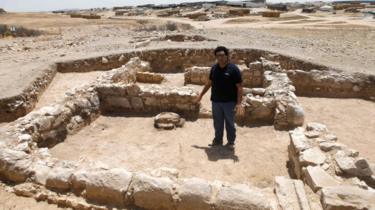 A worker from Israel's Antiquities Authority at the site of an ancient mosque