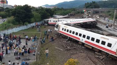 Train carriages photographed on their side