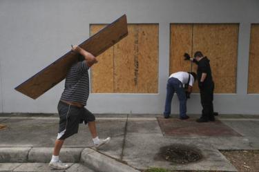 Residents put plywood up in Port St Joe, Florida