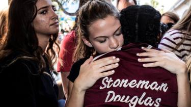 Students from Marjory Stoneman Douglas High School attend a memorial following a school shooting incident in Parkland, Florida