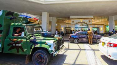 Security forces inspect the scene after a blast targeting Cinnamon Grand hotel in Colombo, Sri Lanka on April 21, 2019
