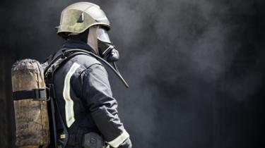 Fireman with protective gear
