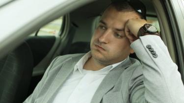 Man stuck in traffic