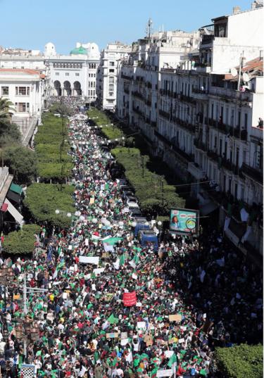 Algerians protesting against President Abdelaziz Bouteflika pictured in the captial, Algiers, on 15 March 2019.