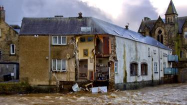 Part of the Bridge House Guest House and Sonia's Bistro in Hawick, Scotland, collapsed into the fast-flowing River Teviot as Storm Ciara battered the UK with high winds and heavy rain, 9 February 2020