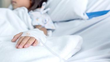 Child in hospital bed