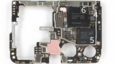 The flipside, showing an American-made flash storage chip (Picture provided by iFixIt.com)