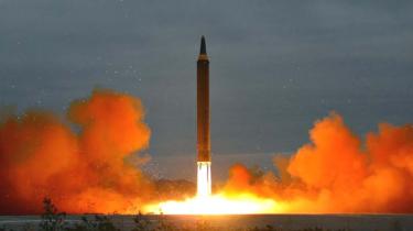 North Korea's intermediate-range strategic ballistic rocket Hwasong-12 lifting off from the launching pad at an undisclosed location near Pyongyang, 30 August 2017