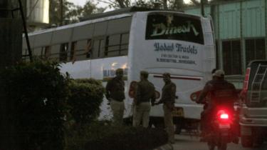 Police investigating the bus at Thyagraj stadium, in which a Paramedical student was reportedly raped in a moving bus, on December 18, 2012 in New Delhi, India.