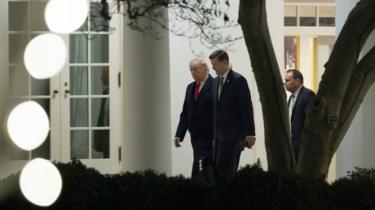 Mr Trump is seen walking with Mr Porter at the White House in December 2017