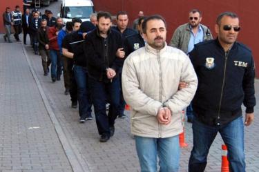 Members of the Turkish police escort suspects of the Gulen movement during nationwide operations, in Kayseri city, Turkey, 26 April 2017.