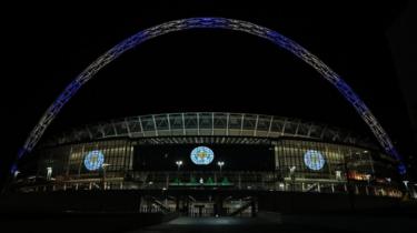 Wembley Stadium lit in Leicester colours