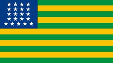 Primeira bandeira republicana do Brasil, com faixas em verde e amarelo, e estrelas