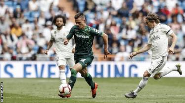 Giovani Lo Celso in action against Real Madrid