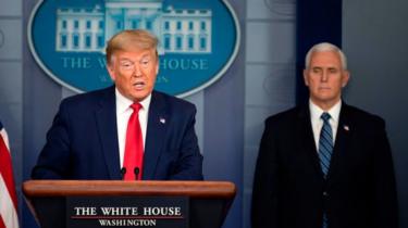 US President Donald Trump, flanked by US Vice President Mike Pence, at the White House press briefing, 3 April 2020