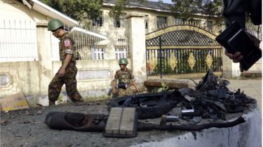 Police inspect bomb wreckage