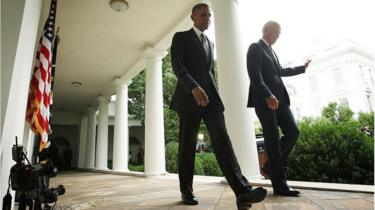 President Barack Obama leaves a press conference with Vice President Joe Biden