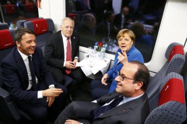 VIP-tunnel excursie (met de klok mee van links): de italiaanse Premier Matteo Renzi, de Zwitserse Federale President Johann Schneider-Ammann, de duitse Bondskanselier Angela Merkel en de franse President Francois Hollande, 1 juni