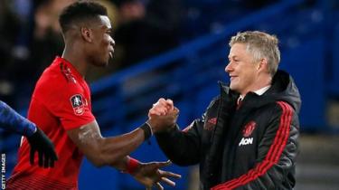 Paul Pogba with Manchester United manager Ole Gunnar Solskjaer