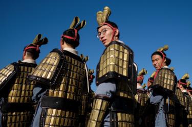 People wearing traditional Chinese dress.