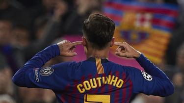 Philippe Coutinho points to his ears after scoring against Manchester United