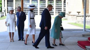 Donald Trump walks into Buckingham Palace