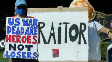 Protesters gather outside Trump National Golf Club in Sterling, Virginia, US, 5 September