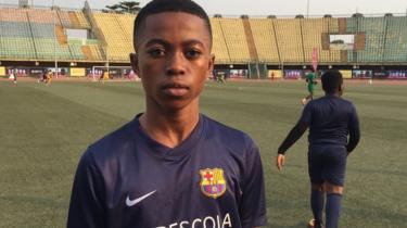 Somagbe Ipedumi from Ikorodu, is a recruit of the Barcelona Academy in Lagos, stands on the pitch.