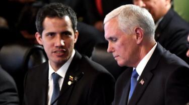 Juan Guaidó y Mike Pence