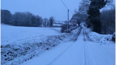 snow on country road