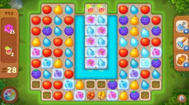 Una serie di piastrelle colorate a forma di frutta sono disposte in una griglia in questa schermata di gioco mobile