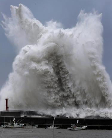 Giant waves breaking at the shore