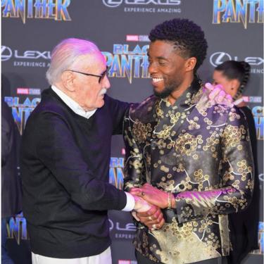 Stan Lee shakes Chadwick Boseman's hand