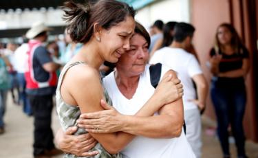 Relatives of those who remain missing following the dam collapse in Brumadinho, Brazil, 26 January 2019