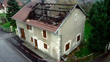 A picture taken on 12 January 1993 shows the burned house of Jean-Claude Romand in Prévessin-Moëns