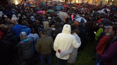 People at a vigil in Pittsburgh's Squirrel Hill