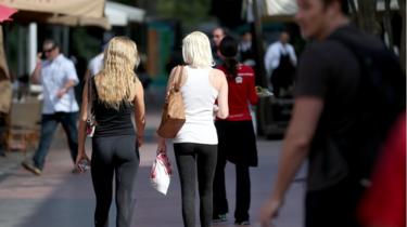 Women wearing leggings on the street