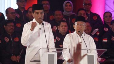 Joko Widodo (left) and his running mate, Ma'ruf Amin (right)