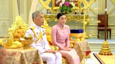 King Maha Vajiralongkorn and his consort, General Suthida Vajiralongkorn named Queen Suthida attend their wedding ceremony in Bangkok, Thailand May 1, 2019, in this screen grab taken from a video.