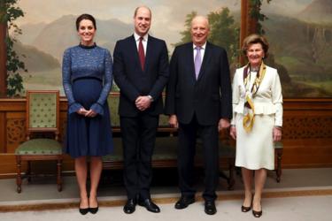 The Duke and Duchess of Cambridge pose for a picture with King Harald V and Queen Sonja