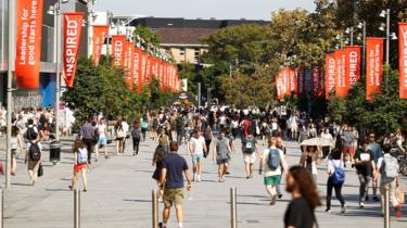 Students walk through an Australian university campus